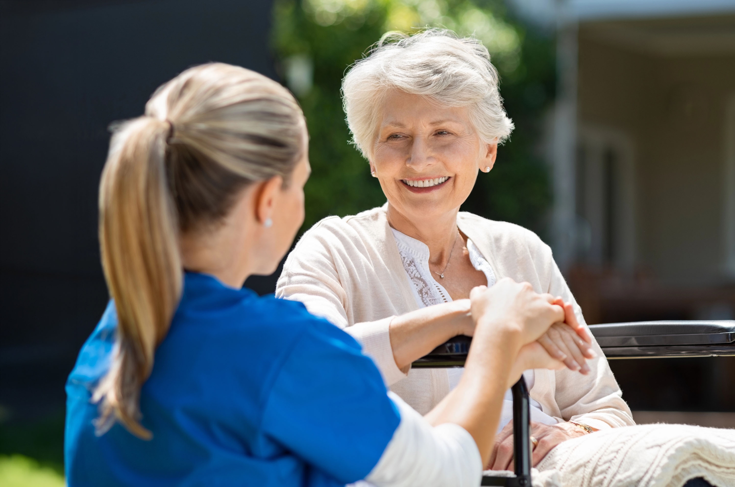 Nurse takes care of old patient